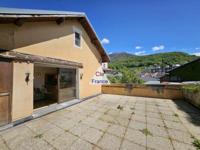 House with Terrace Overlooking the Mountains
