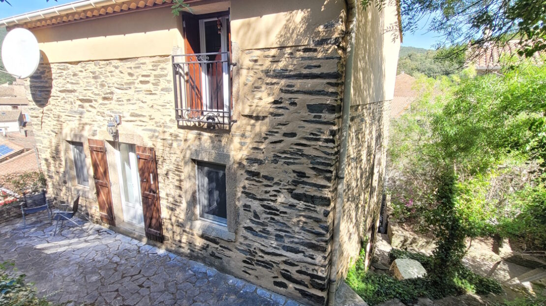 Large Village House with a Terraced Garden