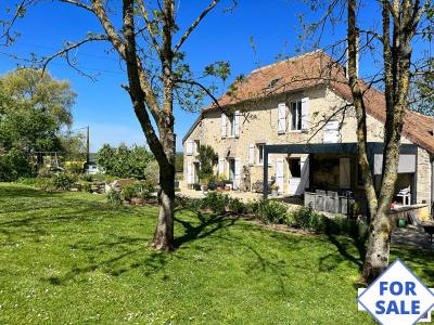 Two Detached Houses and Landscaped Gardens