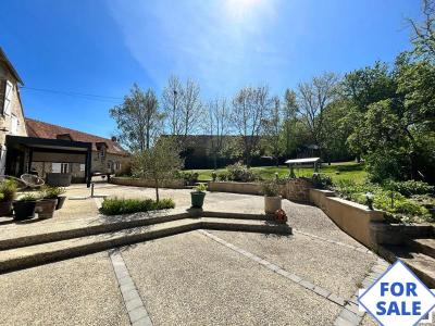 Two Detached Houses and Landscaped Gardens