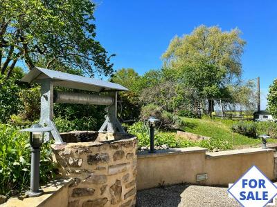 Two Detached Houses and Landscaped Gardens