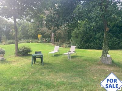 House in Woodland Plot with Pond