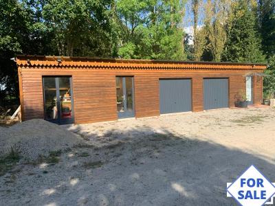 House in Woodland Plot with Pond