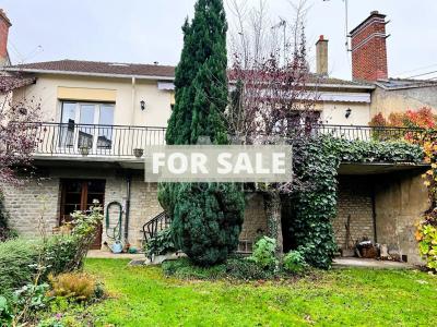 Lovely Town House with Outbuilding in Landscaped Garden