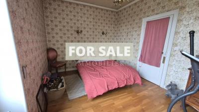 Character in Village with Garden and Garage