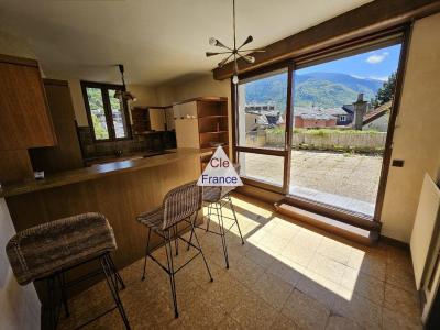 House with Terrace Overlooking the Mountains