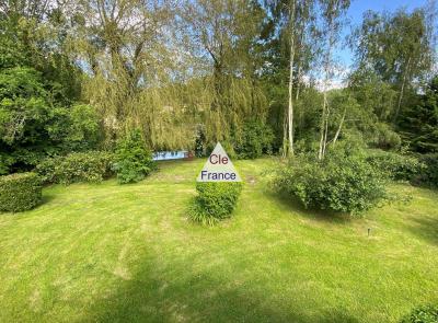 Detached House with Landscaped Garden by a River