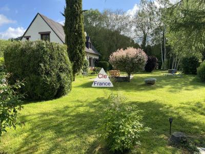 Detached House with Landscaped Garden by a River
