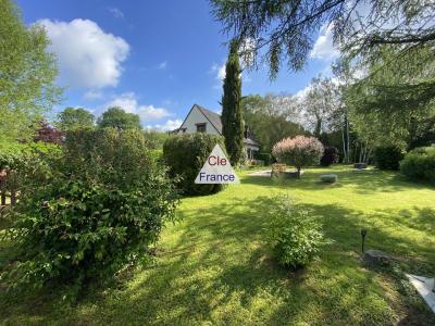 Detached House with Landscaped Garden by a River