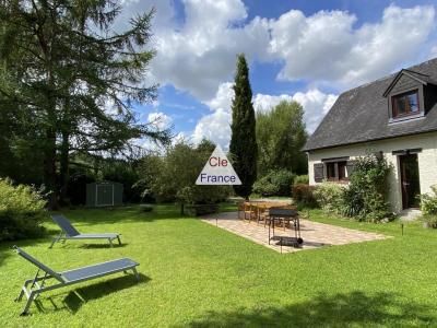 Detached House with Landscaped Garden by a River
