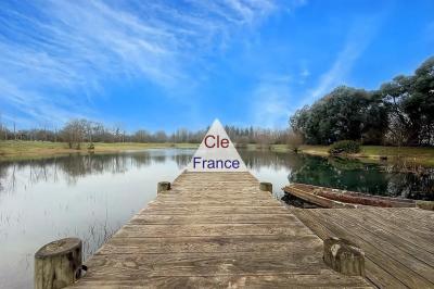 Exceptional Detached House with Lake in 1.5 Hectares