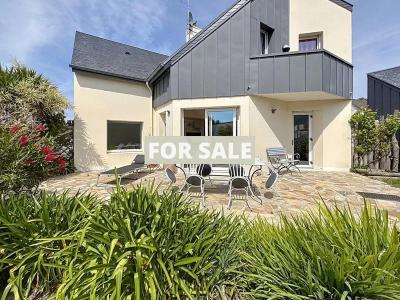Detached Coastal House with Landscaped Garden