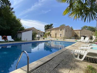 Property with Two Main Houses, Five Gites and Swimming Pool