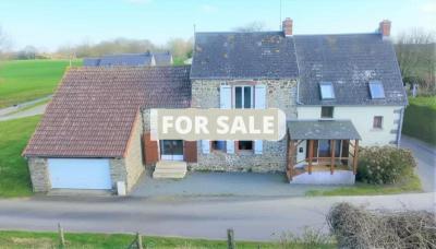 Two Houses Surrounded By Countryside
