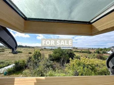 House with Garage and Garden by the Coast