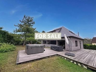 Detached Coastal House with Landscaped Garden