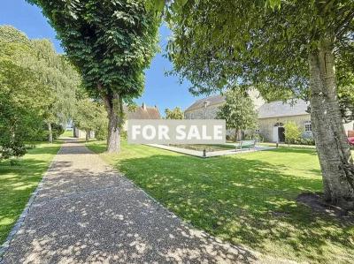 Manor House with Outbuildings and Landscaped Grounds