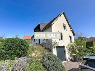 Detached Coastal House with Landscaped Garden