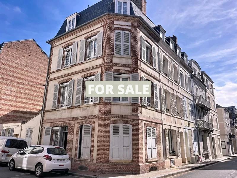 Building in Coastal Town with Rental Income