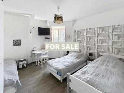 Building in Coastal Town with Rental Income