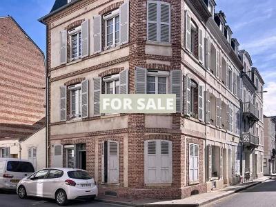 Building in Coastal Town with Rental Income