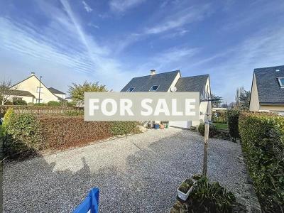 Detached Coastal House with Landscaped Garden