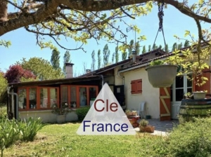 Detached House with Small Lake in Landscaped Garden