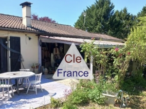 Detached House with Small Lake in Landscaped Garden
