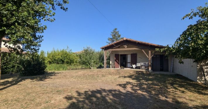 Charming and Cosy House with Bridge over Pond in Garden