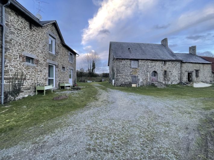 Farmhouse and Outbuildings with Land