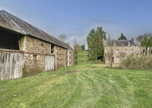 Detached Country House with Outbuildings by a Stream
